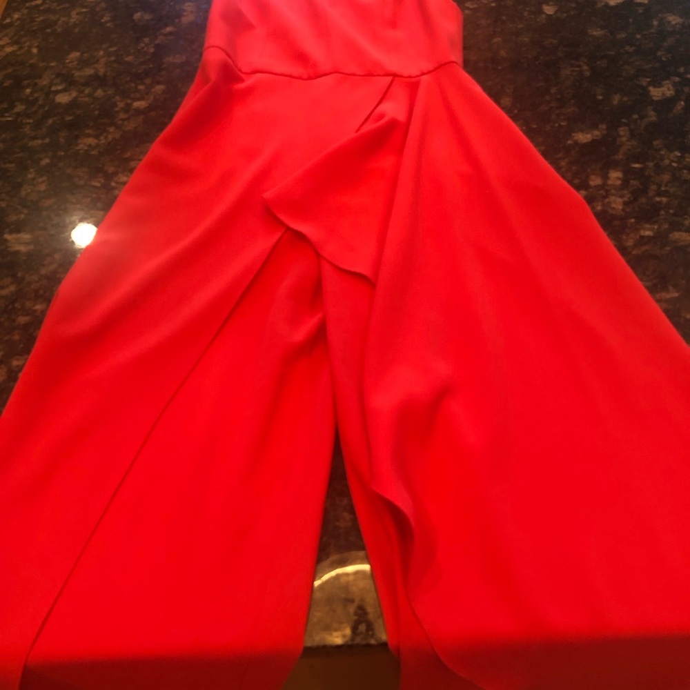 Alice +Olivia jumpsuit flowing leg, low v cut top. Size back. Size 2. Like new.